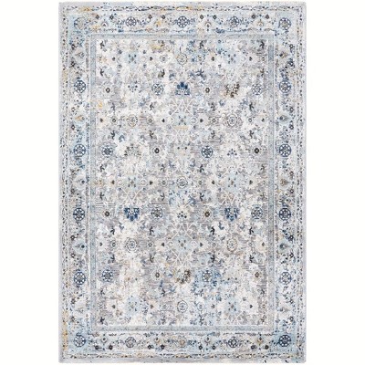 Takeysha Ivory and Navy 6'7" x 9'6" Synthetic Wool Area Rug