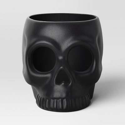 Medium Ceramic Stoneware Skull Candle Holder with Reactive Glaze Black - Threshold™