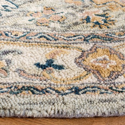 Ivory Round Hand-Tufted Wool Area Rug