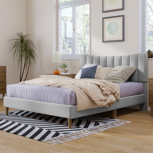 Gray tufted platform deals bed