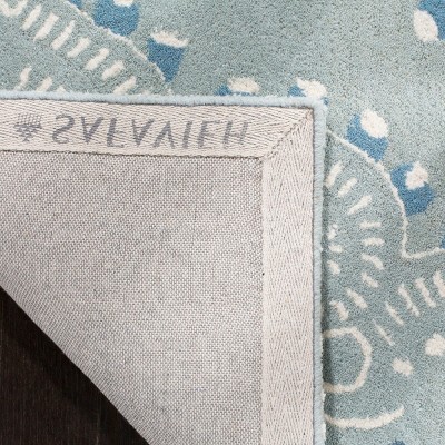 Blue and Ivory Hand-Tufted Wool 4' x 6' Area Rug