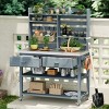 64.9"H Outdoor Potting Bench with Stainless Steel Top, Solid Wood Kitchen Island Table with Wheels, Upper Hutch, Towel Rack, Storage – Cuddlewood - 2 of 4