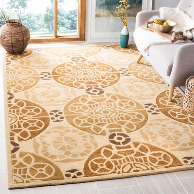Capri 6' x 9' Gold and Multi Hand-Tufted Wool Area Rug