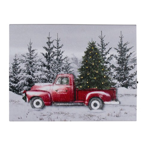 lighted red truck with christmas tree