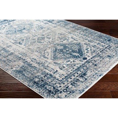 Elegant Sky Blue 9' x 12' Synthetic Stain-Resistant Area Rug