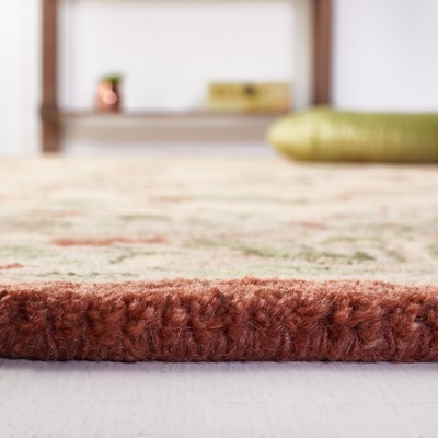 Antiquity Rust and Ivory Wool 3' x 5' Hand-Tufted Area Rug