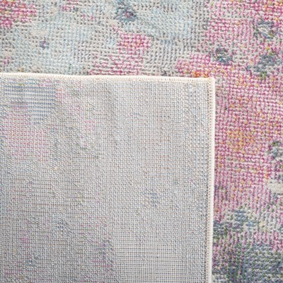 Ivory and Pink Abstract Synthetic Area Rug