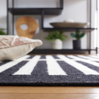 Black and Ivory Striped Wool 5' x 8' Flat Weave Rug