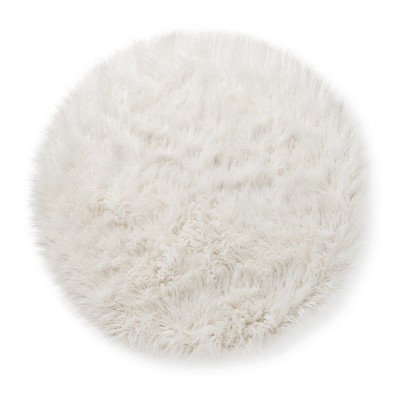 round faux fur pillow