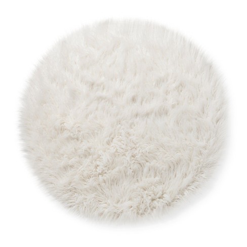 Small white fur rug