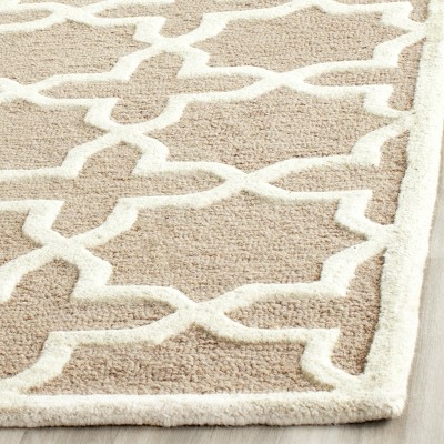 Ivory and Beige Hand-Tufted Wool Area Rug, 9' x 12'