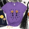 Simply Sage Market Women's Pumpkin Skeleton Short Sleeve Graphic Tee - 2 of 4