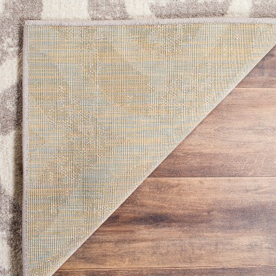 Ivory and Mauve Geometric Low Pile Area Rug