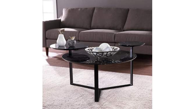 Wibeau Faux Marble Cocktail Table Black - Aiden Lane, 2 of 10, play video
