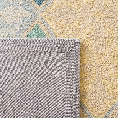 Handmade Ivory Wool Square Area Rug with Floral Design