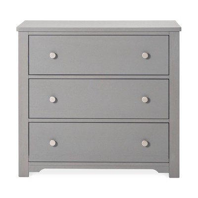 white dresser with changing table topper