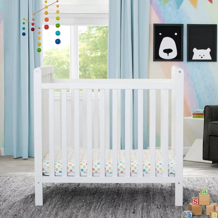 How to Convert a Toddler Room to a Toddler + Baby Shared Bedroom, Delta Children® Mini Crib Classic