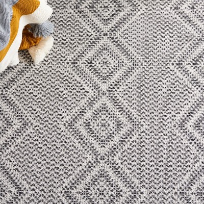 Ivory and Black Geometric Cotton Synthetic Rectangular Area Rug
