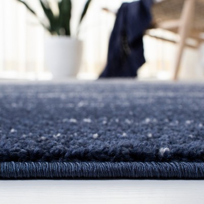 Navy and Ivory Ombre Round Synthetic Area Rug