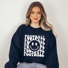 Simply Sage Market Women's Graphic Sweatshirt Football Smiley Face - 2 of 4