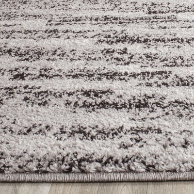 Reversible Black Stripe Synthetic 8' x 10' Rectangular Rug