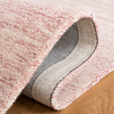Hand-Tufted Pink and Ivory Wool Area Rug, 5' x 8'