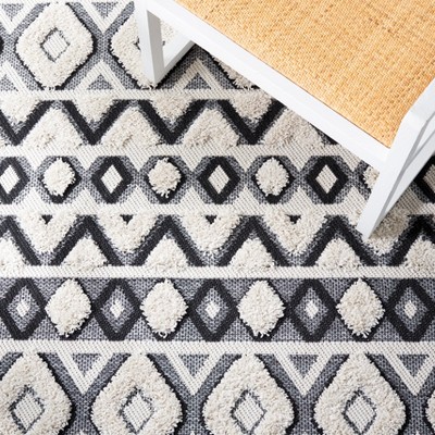 Ivory and Black 8' x 10' Synthetic Rectangular Rug
