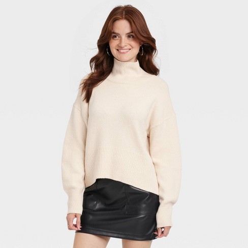 Cream colored store mock turtleneck