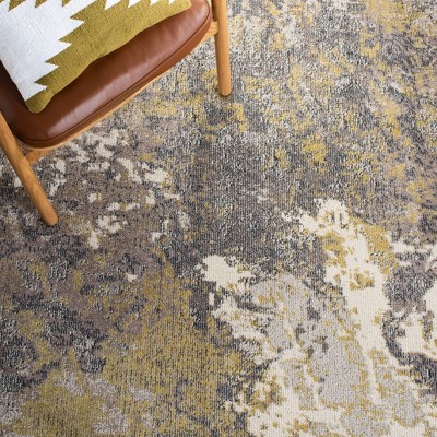 Ivory and Grey Abstract Round Synthetic Area Rug