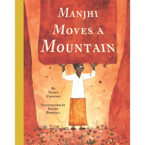 Manjhi Moves a Mountain - by  Nancy Churnin (Hardcover) - 1 of 1