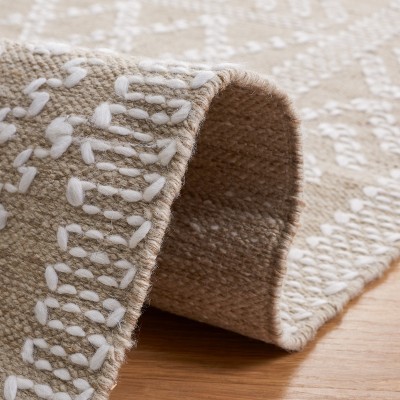 Ivory and Beige 3' x 5' Synthetic Flat Woven Handmade Area Rug