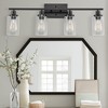 DORESshop 32 in. 4-Light Industrial Matte Black Vanity Light Fixtures for Bathroom with Clear Glass Shades - 2 of 4