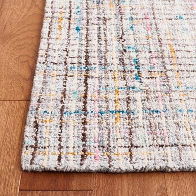 Handmade Tufted Red Abstract Wool Rectangular Rug