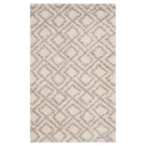 Ivory/Beige Abstract Loomed Accent Rug - (3