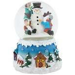 Northlight 5.75" Children Building Snowman Musical Christmas Snow Globe