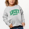 The Juniper Shop Lucky Vibes Distressed Toddler Graphic Sweatshirt - 2 of 3