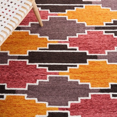 Rodeo Drive 6' x 9' Black and Rust Hand-Tufted Wool Area Rug