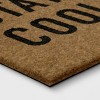 1'6"x2'6" Stay Cool Dog with Floatie Faux Coir Outdoor Doormat - Sun Squad™ - 2 of 3