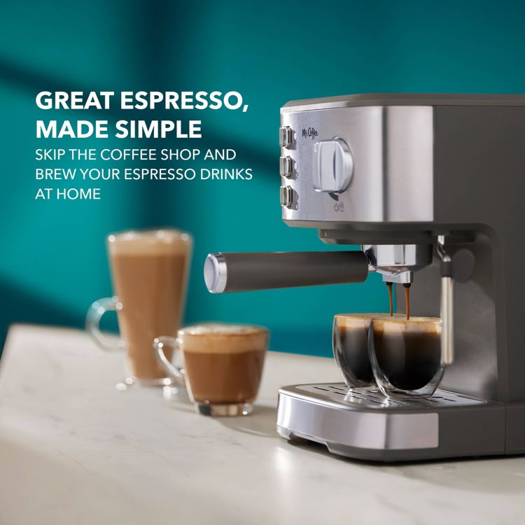 A silver and gray colored espresso maker brewing two cups of espresso, with text reading "Great Espresso, Made Simple" and "Skip the coffee shop and brew your espresso drinks at home."