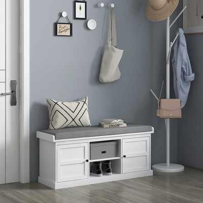 White Wood Storage Bench with Gray Cushion and Cabinets