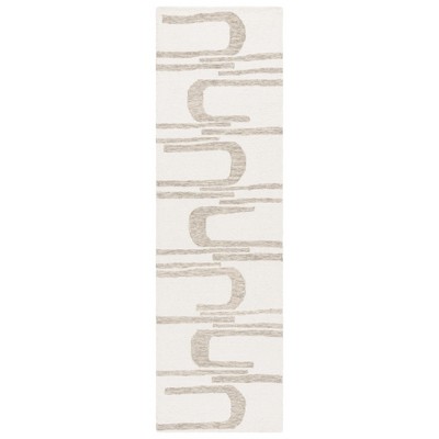 Ebony EBN951 Handmade Tufted Rug - Safavieh