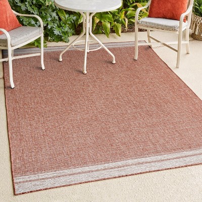 Alda Modern Minimalist Mingled Solid Indoor/Outdoor Area Rug - JONATHAN Y