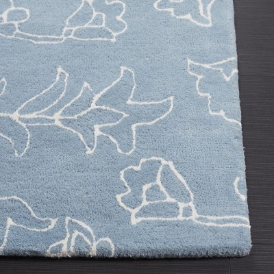 Blue and Ivory Handmade Wool Tufted Area Rug