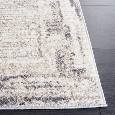 Ivory and Gray Synthetic Rectangular Area Rug, 5'3" x 7'6"