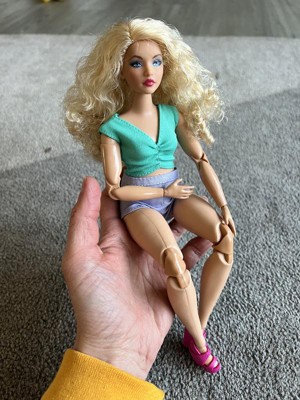 Looks Doll Blonde Hair And Purple Shorts :