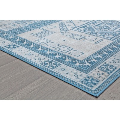 Azure Elegance 5' x 7' Reversible Blue Synthetic Area Rug
