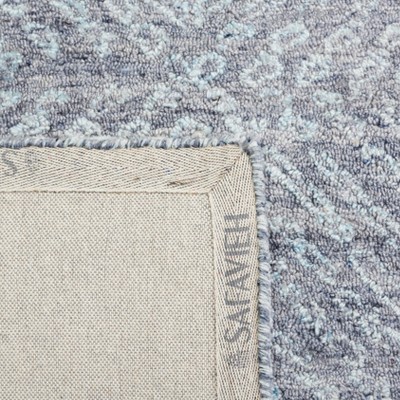 Handmade Blue Abstract Tufted Wool Rectangular Rug 27" x 4"