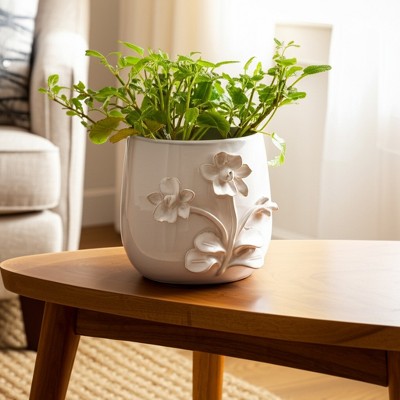 Embossed Floral Ceramic and Stoneware Planter with Sculpted Detailing and Round Body Design