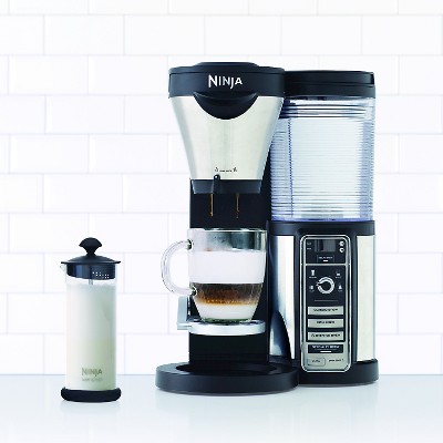 The Ninja Coffee Bar Milk Frother is an incredibly versatile accessory that can be seamlessly integrated into any coffee setup. Whether you want to enhance your cappuccinos, lattes, or macchiatos, this frother is up to the task. Enjoying a cup of hot cocoa or chai tea? Look no further – this device can also froth milk for these delightful beverages. Thanks to its compact and chic design, the frother can be conveniently stored in any kitchen space.