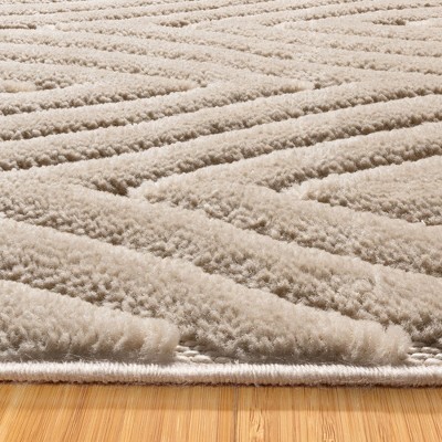 Beige Geometric Tufted Rectangular 6' x 9' Synthetic Rug